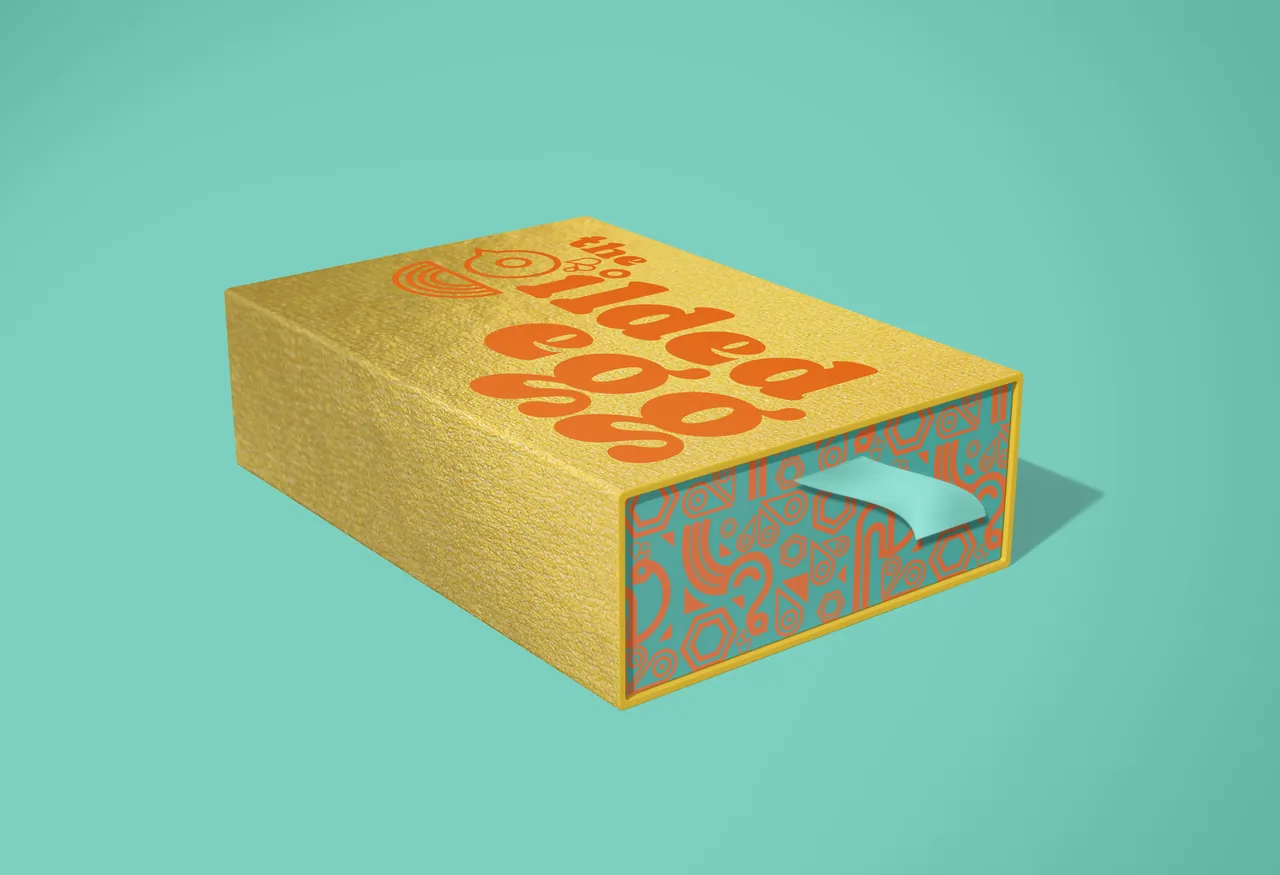 The Gilded Egg box mockup by Cassandra Tallman.